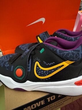 Nike Kids Black Sneakers with Yellow Swoosh and Purple Lining